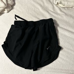 Black nike small shorts.